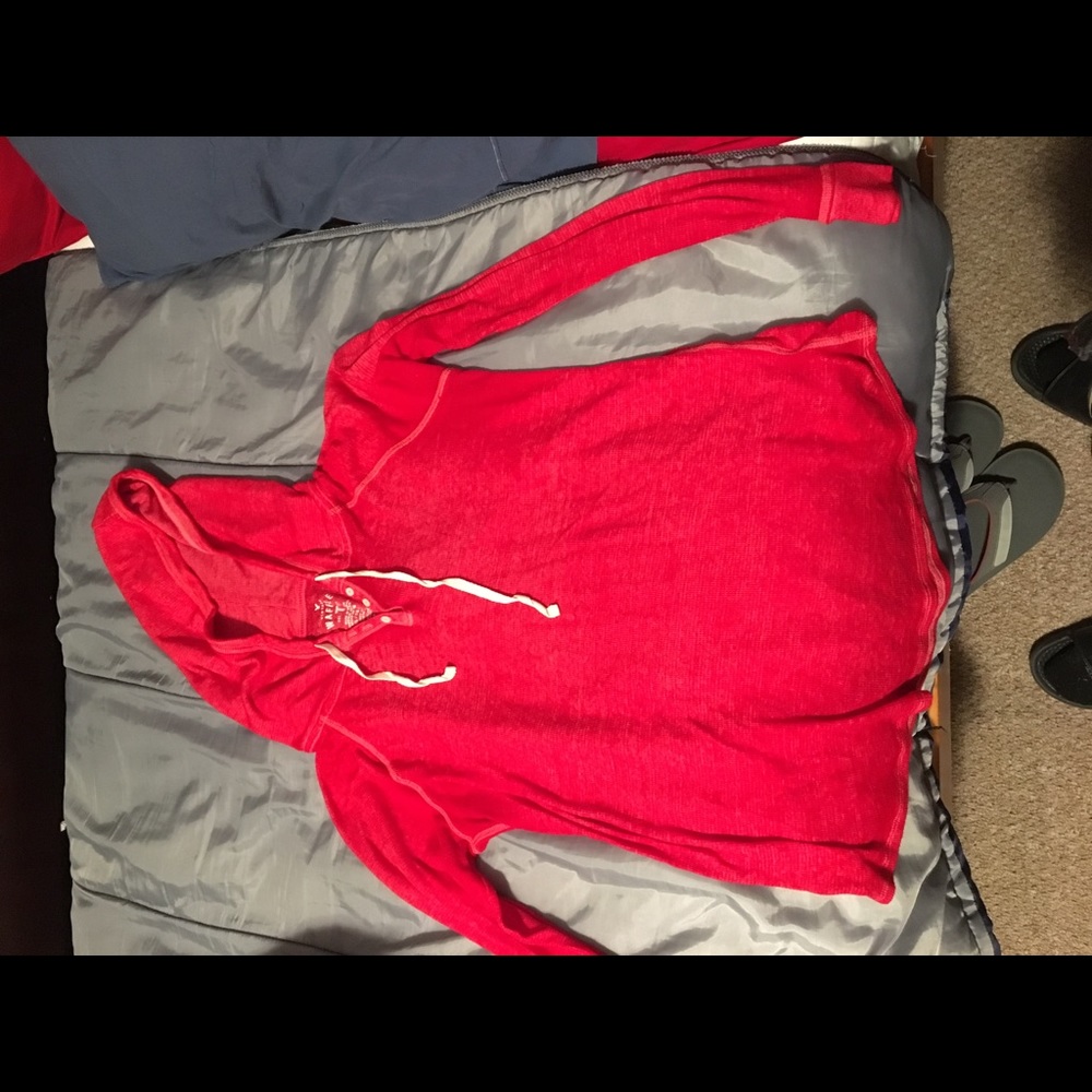 Vibrant red sweater shirt thingy
